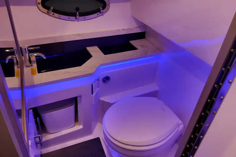 Yacht Photos Pics Luxury bathroom in 2026 Formula 330 Crossover Bowrider OB with modern fixtures and ambient lighting.