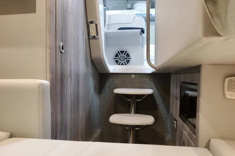  Yacht Photos Pics Interior view of 2026 Formula 330 Crossover Bowrider OB, featuring steps and modern design.