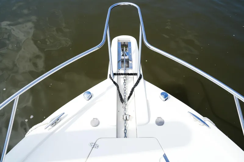  Yacht Photos Pics Bow view of 2008 Scout 295 Abaco boat with anchor and railing.