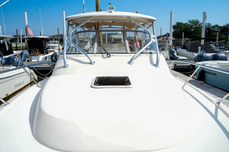  Yacht Photos Pics 2008 Scout 295 Abaco boat docked at marina, showcasing sleek design and sturdy build.