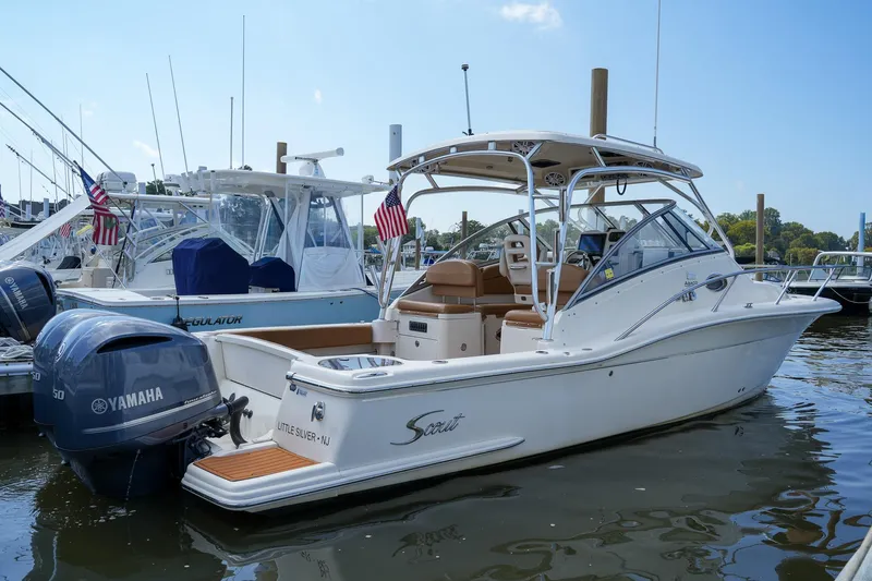  Yacht Photos Pics 2008 Scout 295 Abaco boat docked with Yamaha engines, featuring sleek design and American flags.
