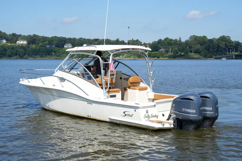  Yacht Photos Pics 2008 Scout 295 Abaco boat with twin Yamaha engines on a calm lake.