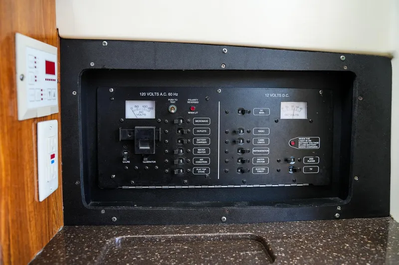  Yacht Photos Pics Electrical control panel on a 2008 Scout 295 Abaco boat interior.