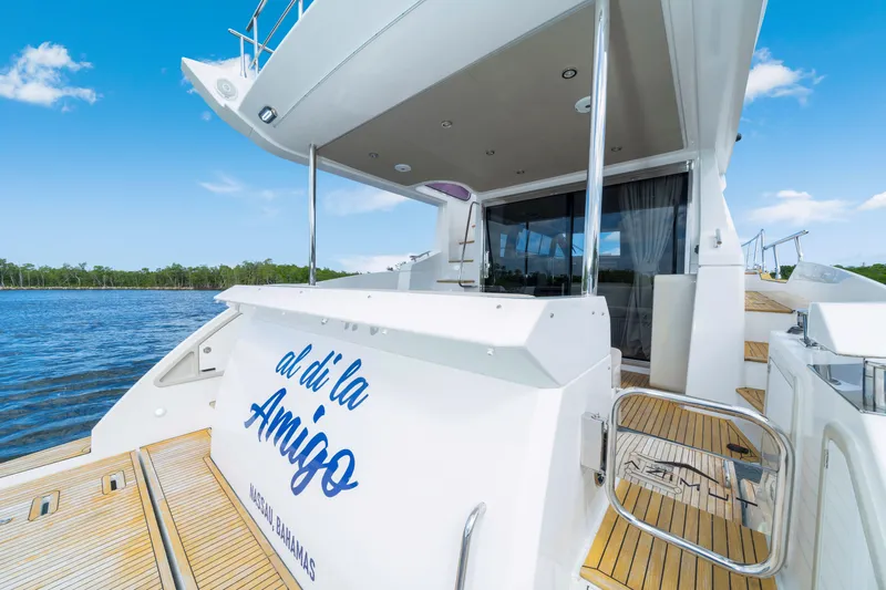 Our Trade Yacht Photos Pics Azimut 50 Fly 2018 yacht on water, featuring elegant deck and sleek design.