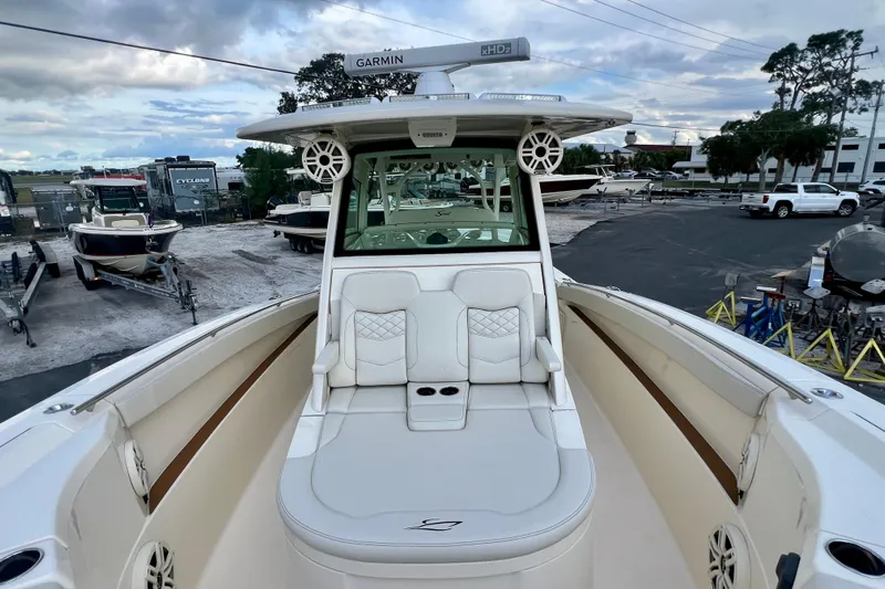  Yacht Photos Pics 2023 Scout 330 LXF boat with luxurious seating and advanced Garmin technology.