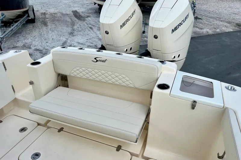  Yacht Photos Pics 2023 Scout 330 LXF boat with dual Mercury engines and cushioned seating.