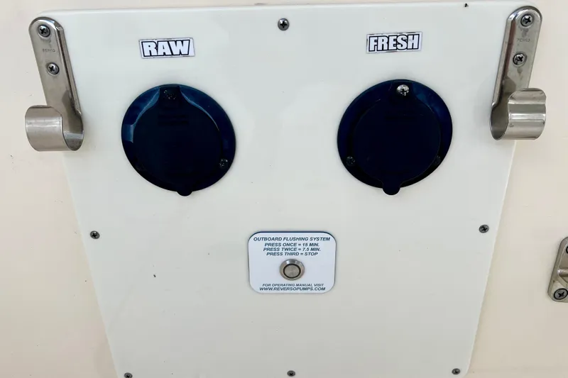  Yacht Photos Pics 2023 Scout 330 LXF boat flushing system with raw and fresh water options.