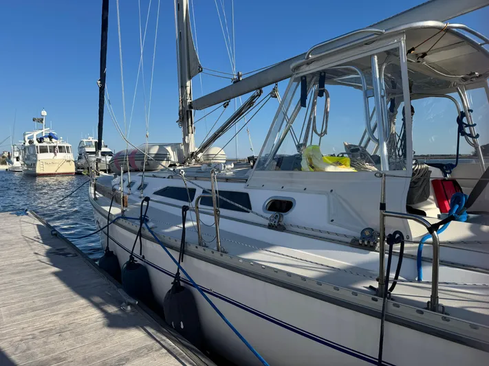 Shenanigans Yacht Photos Pics Catalina 400 MkII sailboat docked at marina, clear blue sky, 2001 model.