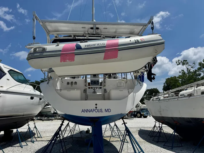 Shenanigans Yacht Photos Pics Catalina 400 MkII sailboat from 2001, docked in Annapolis, MD, with a dinghy attached.