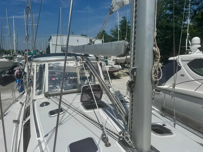 Shenanigans Yacht Photos Pics Sailboat deck of 2001 Catalina 400 MkII in marina, surrounded by other boats.