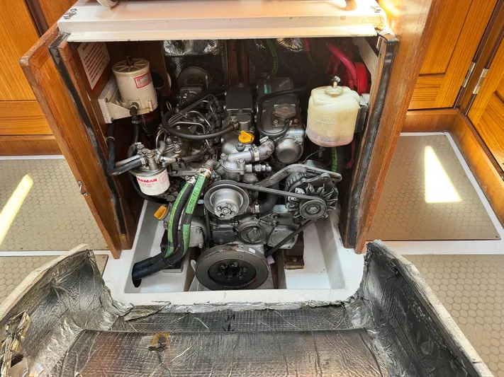 Shenanigans Yacht Photos Pics Engine compartment of a 2001 Catalina 400 MkII sailboat, showcasing detailed mechanical components.