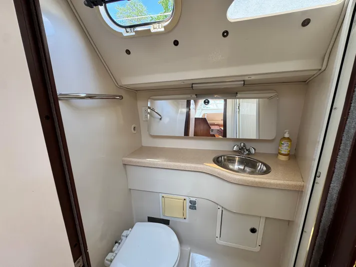 Shenanigans Yacht Photos Pics Aft head with separate shower and electric toilet