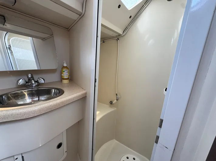 Shenanigans Yacht Photos Pics Aft head with separate shower and electric toilet