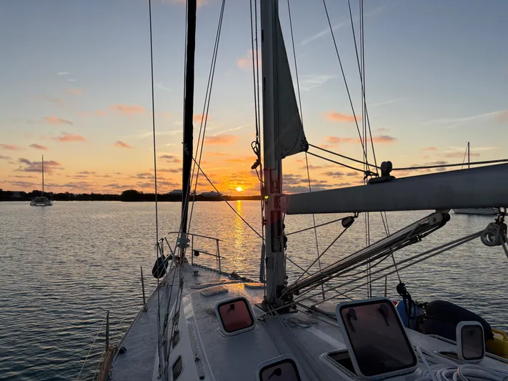 Shenanigans Yacht Photos Pics Sailboat Catalina 400 MkII at sunset on calm waters, 2001 model.