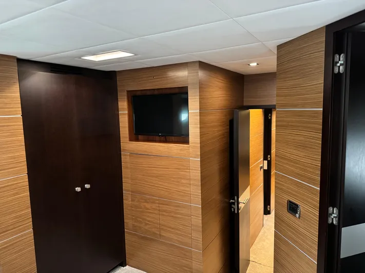 My Biscane Yacht Photos Pics Luxurious interior of 2007 Astondoa A 76 GLX yacht with wood paneling and modern design.