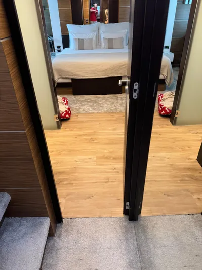 My Biscane Yacht Photos Pics Luxurious bedroom interior of 2007 Astondoa A 76 GLX yacht with modern decor.