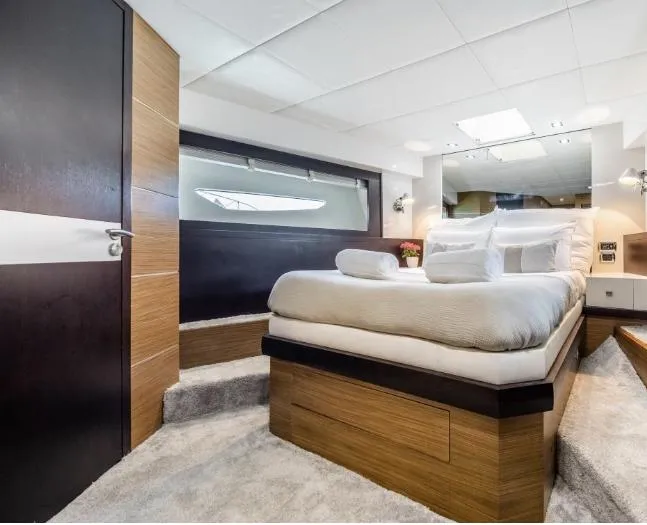 My Biscane Yacht Photos Pics Luxurious bedroom interior of 2007 Astondoa A 76 GLX yacht with modern design and cozy bedding.