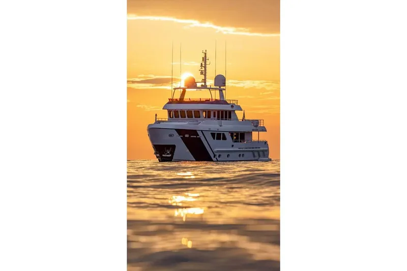 Empire Yacht Photos Pics 2024 Cantiere Delle Marche Darwin 86 yacht at sunset on calm sea.