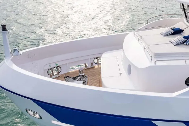 Empire Yacht Photos Pics 2024 Cantiere Delle Marche Darwin 86 yacht deck with sunbathing area and ocean view.