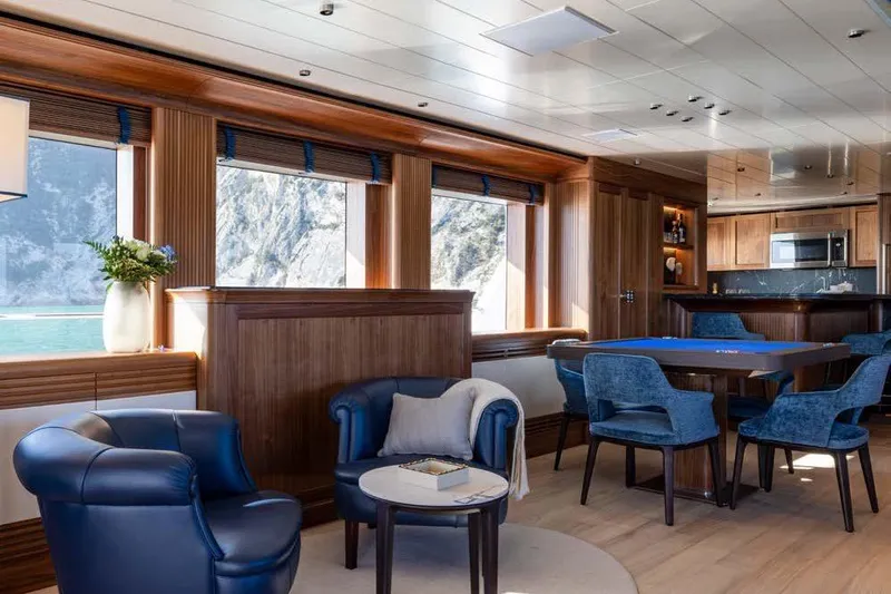 Empire Yacht Photos Pics Luxurious interior of 2024 Cantiere Delle Marche Darwin 86 yacht with elegant seating and dining area.