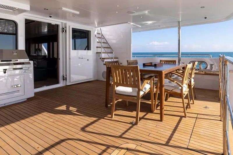 Empire Yacht Photos Pics Luxurious deck of 2024 Cantiere Delle Marche Darwin 86 yacht with dining area.