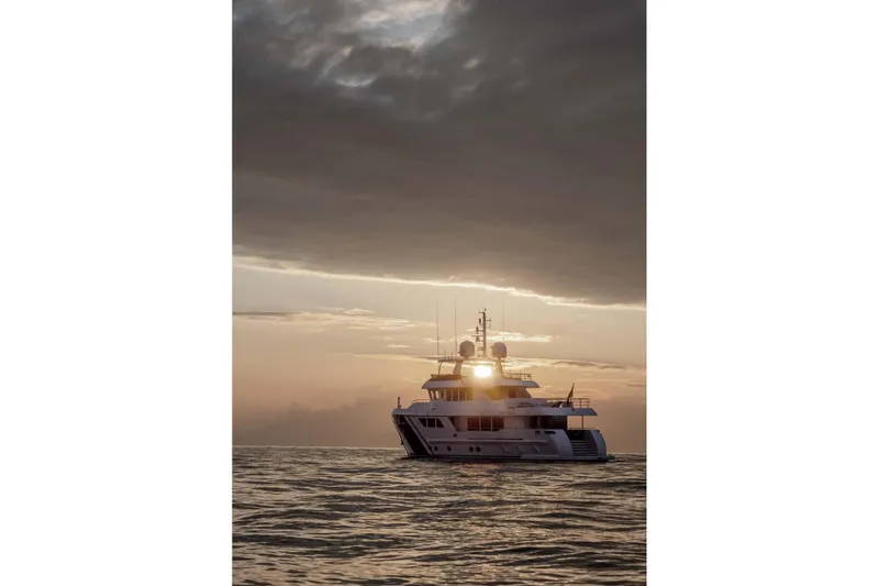 Empire Yacht Photos Pics 2024 Cantiere Delle Marche Darwin 86 yacht at sunset on the ocean.