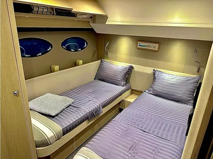  Yacht Photos Pics Twin cabin with striped bedding in 2016 Princess yacht interior.