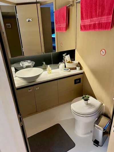  Yacht Photos Pics Modern bathroom in 2016 Princess model yacht with vessel sink and red towels.