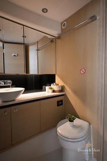  Yacht Photos Pics Modern bathroom in 2016 Princess model yacht with sleek fixtures and wooden cabinetry.
