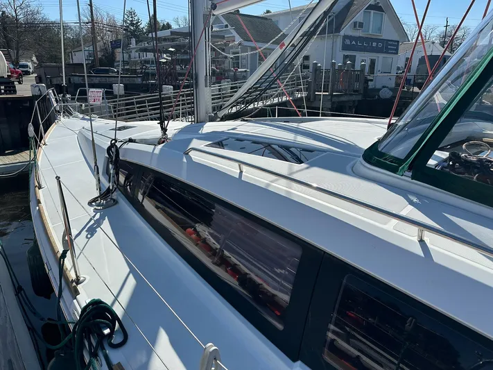 Life Line Yacht Photos Pics 2017 Jeanneau Sun Odyssey 44 DS sailboat docked, showcasing sleek deck design and modern features.