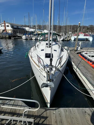 Life Line Yacht Photos Pics 2017 Jeanneau Sun Odyssey 44 DS sailboat docked in a marina.