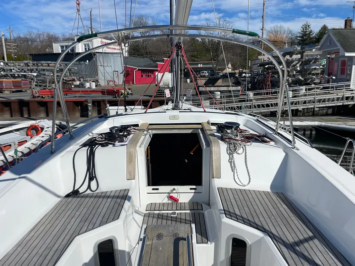 Life Line Yacht Photos Pics Jeanneau Sun Odyssey 44 DS 2017 sailboat cockpit with marina background.