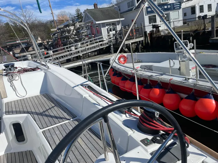 Life Line Yacht Photos Pics Jeanneau Sun Odyssey 44 DS sailboat docked, 2017 model, with visible deck and marina background.