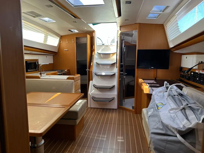 Life Line Yacht Photos Pics Interior of 2017 Jeanneau Sun Odyssey 44 DS sailboat, featuring modern design and cozy seating.