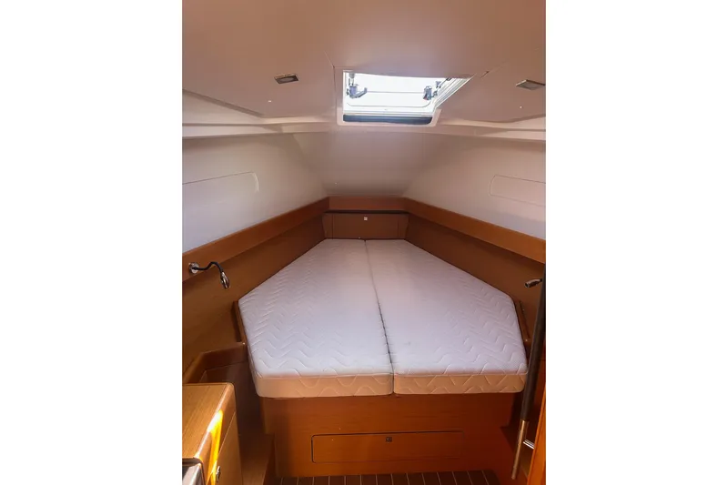Life Line Yacht Photos Pics Cozy cabin interior of 2017 Jeanneau Sun Odyssey 44 DS sailboat with skylight.