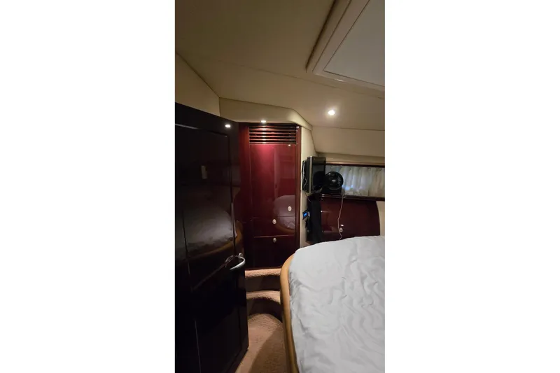  Yacht Photos Pics Interior cabin of 2008 Sea Ray 58 Sedan Bridge yacht, featuring elegant wood finishes.