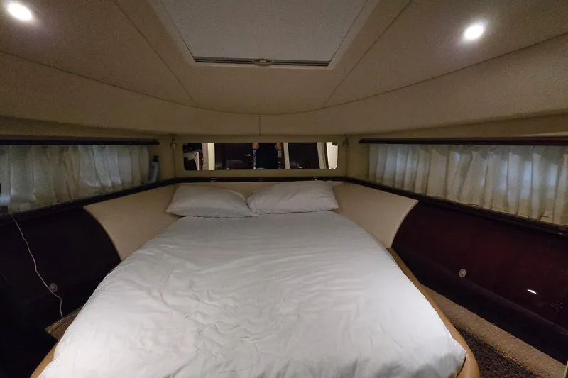  Yacht Photos Pics Luxurious bedroom interior of 2008 Sea Ray 58 Sedan Bridge yacht.