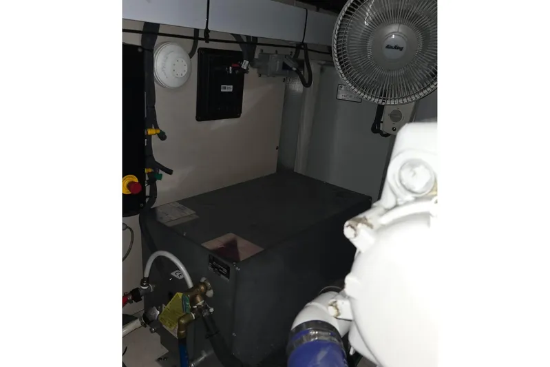  Yacht Photos Pics Engine room of 2008 Sea Ray 58 Sedan Bridge with equipment and fan.