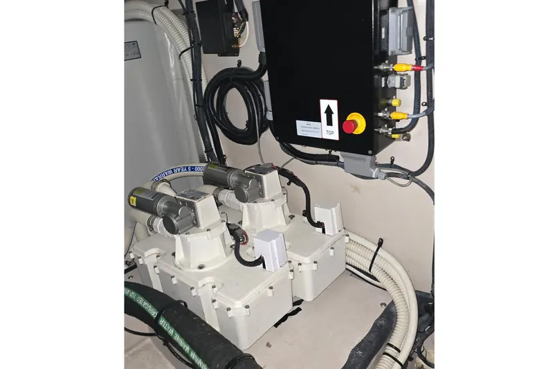  Yacht Photos Pics Engine room of 2008 Sea Ray 58 Sedan Bridge with mechanical components and wiring.