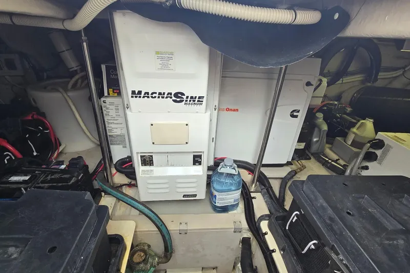  Yacht Photos Pics Engine room of 2008 Sea Ray 58 Sedan Bridge with MagnaSine inverter and Cummins Onan generator.