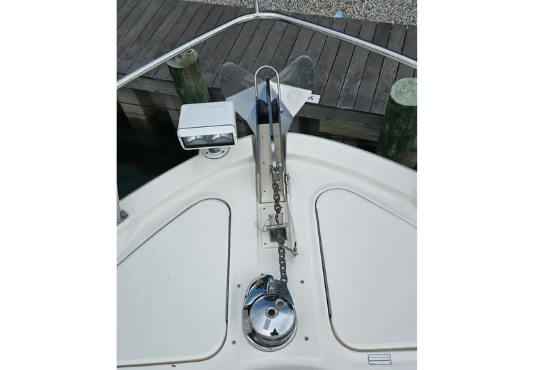  Yacht Photos Pics Bow view of 2008 Sea Ray 58 Sedan Bridge with anchor and spotlight.