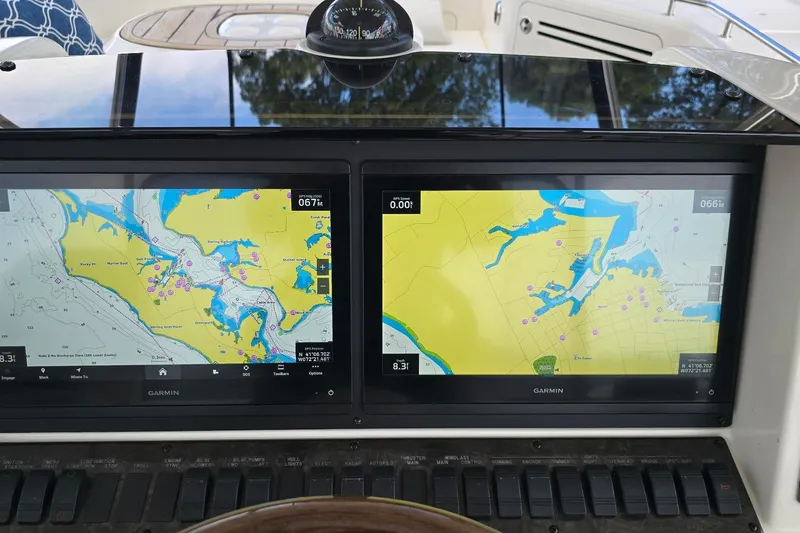  Yacht Photos Pics Navigation screens on a 2008 Sea Ray 58 Sedan Bridge yacht.