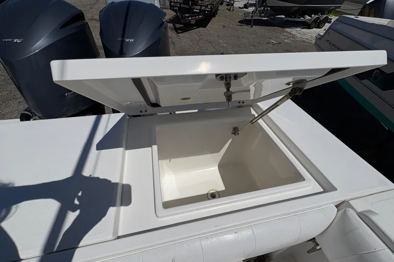  Yacht Photos Pics Open storage compartment on a 2009 Regulator 32 Forward Seating boat.