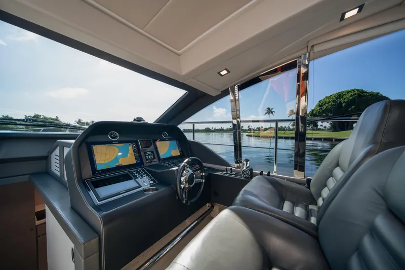 Juice Yacht Photos Pics Interior of 2019 Filippetti S55 yacht with modern navigation system and luxurious seating.