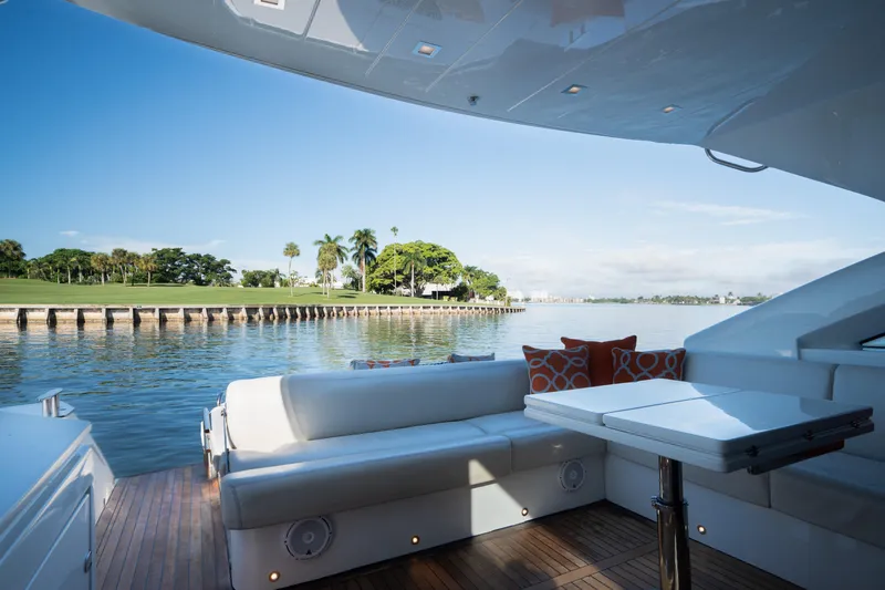 Juice Yacht Photos Pics Luxurious 2019 Filippetti S55 yacht with elegant seating, scenic waterfront view.