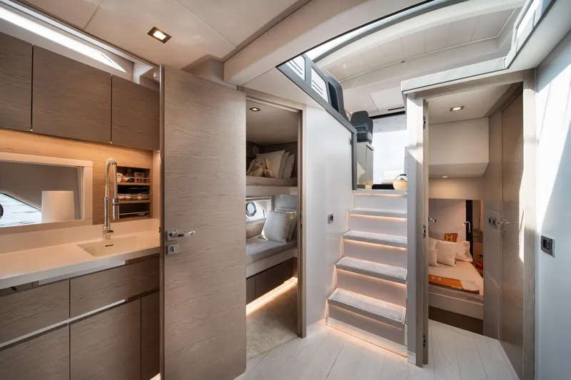 Juice Yacht Photos Pics Luxurious interior of 2019 Filippetti S55 yacht with modern kitchen and cozy cabins.