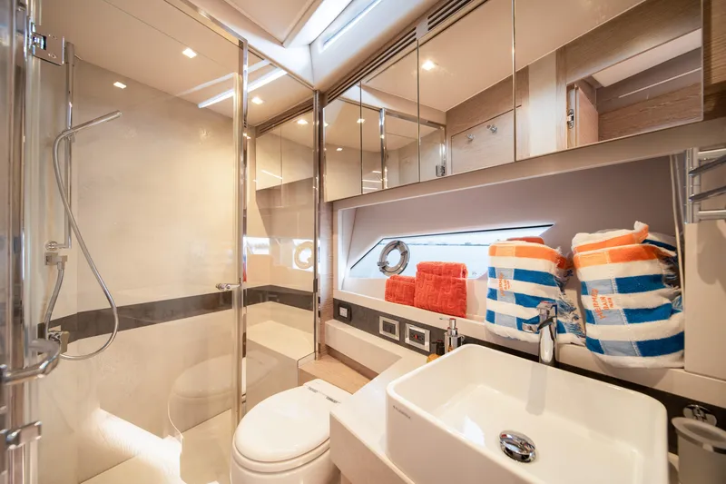Juice Yacht Photos Pics Luxurious bathroom in 2019 Filippetti S55 yacht with modern fixtures and elegant design.