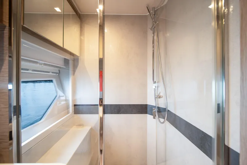 Juice Yacht Photos Pics Luxurious bathroom interior of 2019 Filippetti S55 yacht with modern shower design.