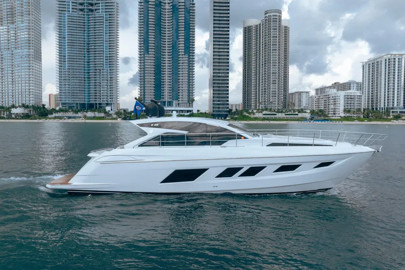 Juice Yacht Photos Pics 2019 Filippetti S55 yacht cruising near modern city skyline.