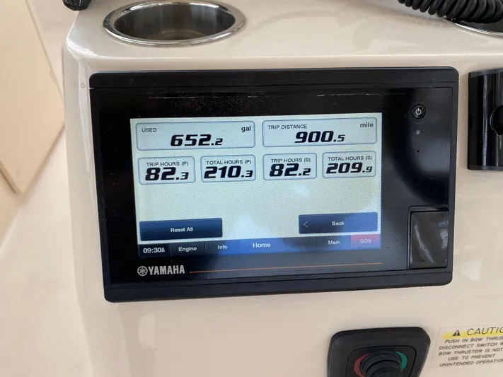  Yacht Photos Pics Yamaha display on 2022 Grady-White Freedom 325 showing fuel usage and trip data.